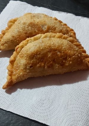 Una foto de Empanadas🥟 de carne cortada a cuchillo!!🔪 Fritas
