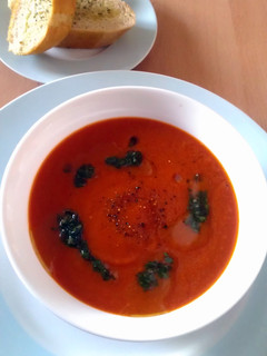 A picture of Vickys Red Pepper Soup with Basil Oil GF DF EF SF NF.
