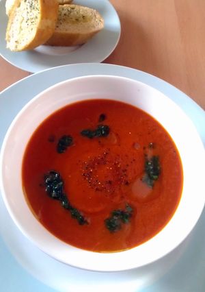 A picture of Vickys Red Pepper Soup with Basil Oil GF DF EF SF NF.
