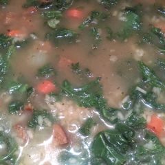 A picture of Andouille Kale Stew with Dirty Rice.