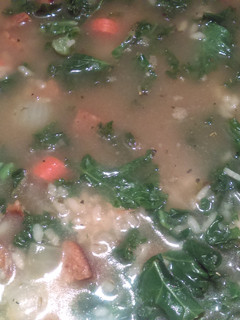 A picture of Andouille Kale Stew with Dirty Rice.