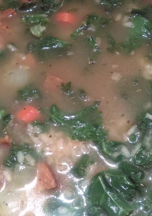 A picture of Andouille Kale Stew with Dirty Rice.