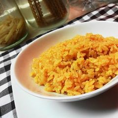 A picture of Easy Paprika Rice with a Rice Cooker.