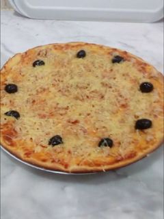 صورة لوصفة بيتزا بالعجينة السحرية