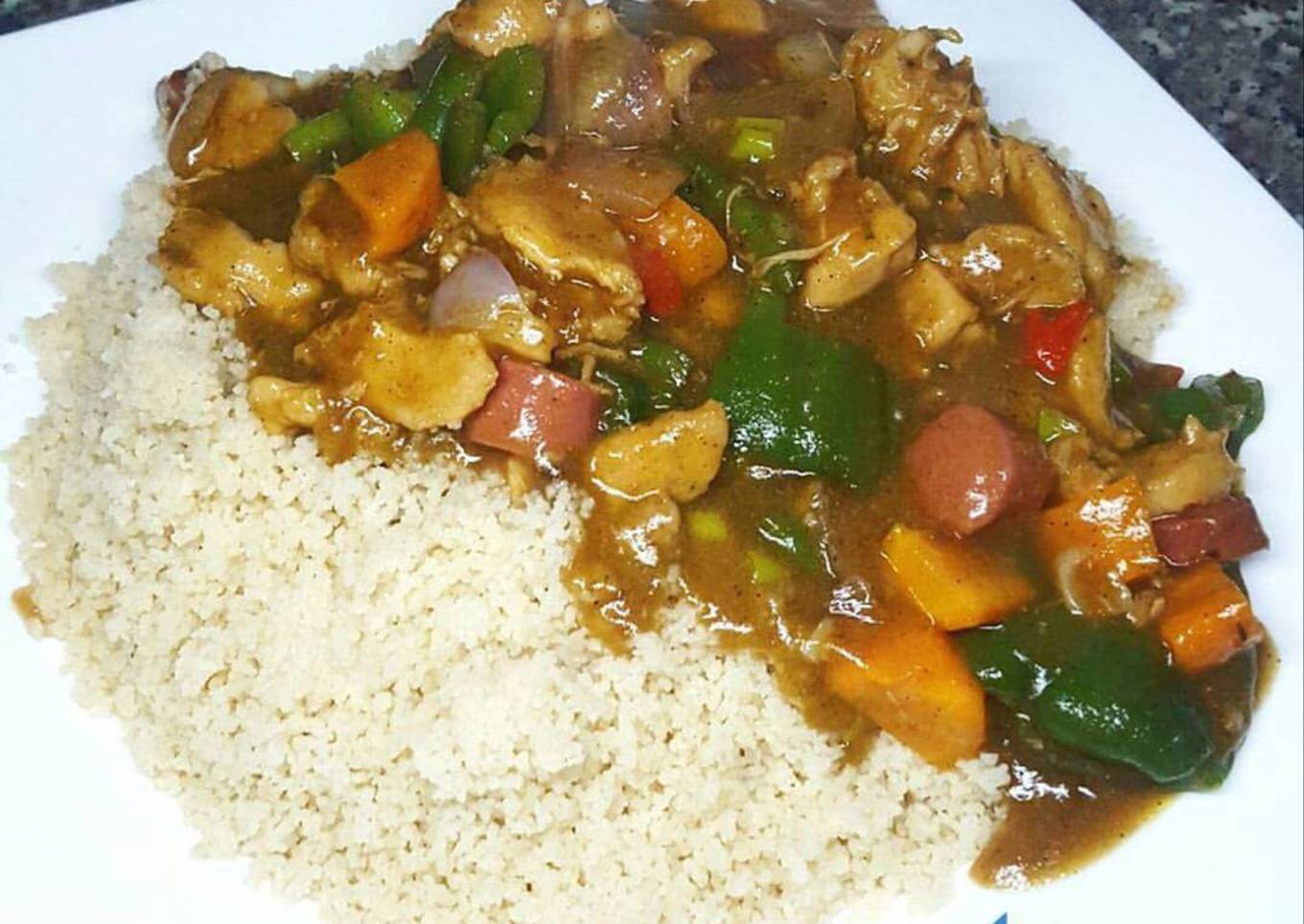 Couscous with chicken, sausage & veggie sauce