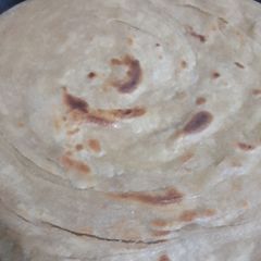 Lacha Paratha | Recipe in Urdu 🌛🌛🌛😇 A picture of Lacha Paratha | Recipe in Urdu 🌛🌛🌛😇.