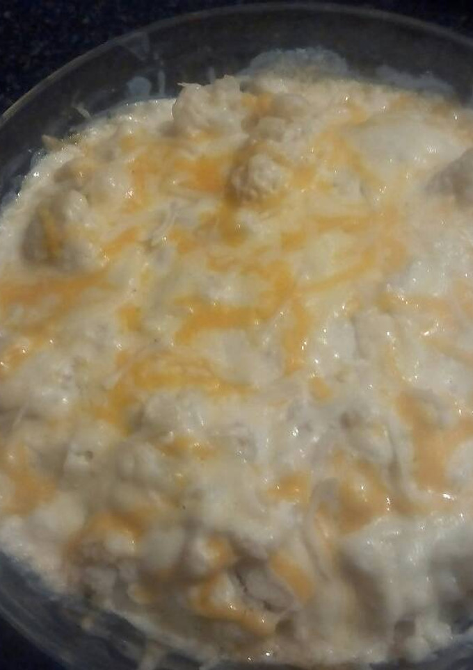 Una foto de coliflor con bechamel al roquefor 