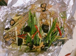 Hình của món Cá rô phi hấp xì dầu.