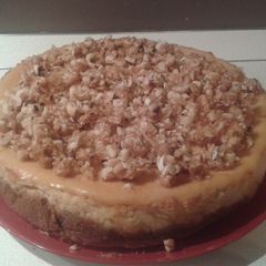 A picture of 'Dulce de Leche' ricotta cheesecake with caramelized hazelnuts.