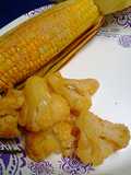 Oven roasted corn unhusked and cauliflower