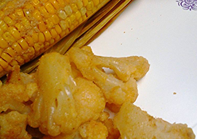 Steps to Make Perfect Oven roasted corn unhusked and cauliflower