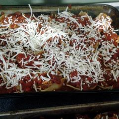 A picture of shels stuffed shells.