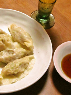 A picture of Boiled Gyoza Dumplings With Slippery Smooth Homemade Skins.