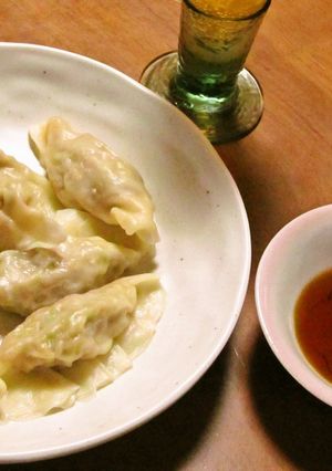 A picture of Boiled Gyoza Dumplings With Slippery Smooth Homemade Skins.