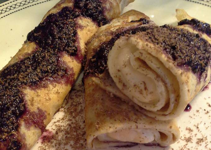 Ricotta Crepes with Raspberry-Chile Coulis and Chocolate Shavings