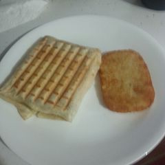 A picture of Breakfast Pannini.