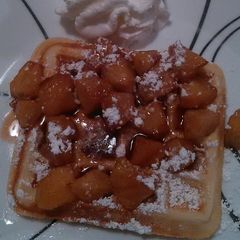 A picture of Belgium waffles w/fresh apple compote.