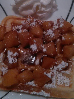A picture of Belgium waffles w/fresh apple compote.