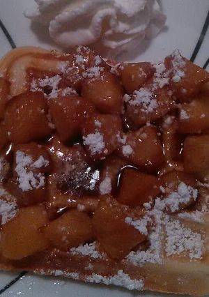 A picture of Belgium waffles w/fresh apple compote.