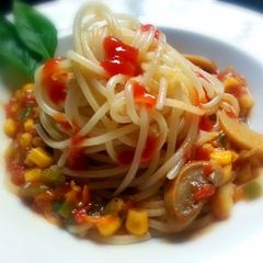 A picture of Spaghetti with vegetables sauce.