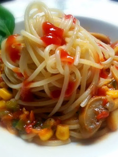 A picture of Spaghetti with vegetables sauce.