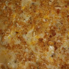 A picture of Creamy Cheesy Baked Fish over Rice.