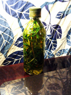 A picture of rosemary infused oil.