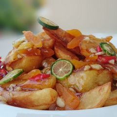 A picture of Fried Potato Salad With Garlic And Dried Apricot In Plum Sauce.