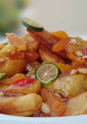 A picture of Fried Potato Salad With Garlic And Dried Apricot In Plum Sauce.