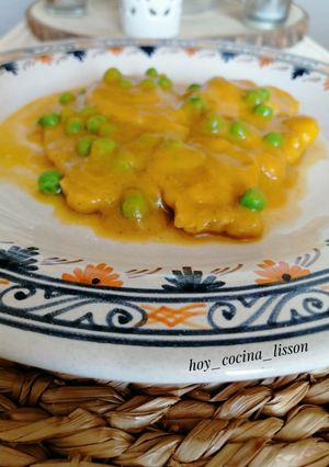 Una foto de Cinta de Lomo en Salsa de Verduras