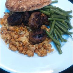 Lamb meatballs with green beans and warm Moroccan salad, for 2 A picture of Lamb meatballs with green beans and warm Moroccan salad, for 2.