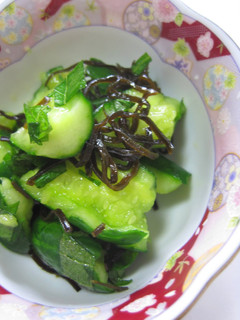 A picture of Instant Bashed Cucumber Pickles with Shio-Konbu and Shiso leaves.