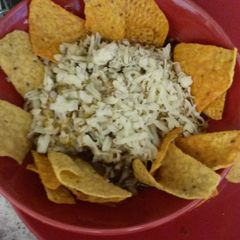 A picture of Beef Salsa with Tortillas to dip.