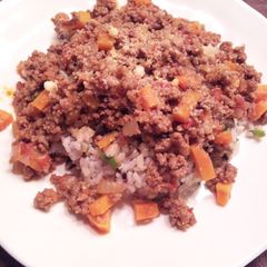A picture of Meat Sauce Over Fried Rice.