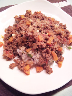 A picture of Meat Sauce Over Fried Rice.