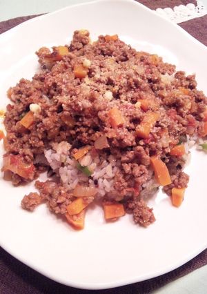 A picture of Meat Sauce Over Fried Rice.