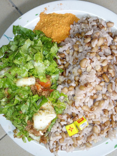 A picture of Shinkafa da wake (garau-garau) with local salad.