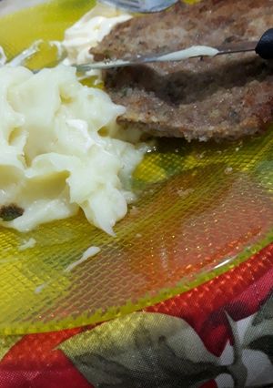 Una foto de Milanesas con puré casero