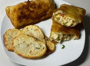 Una foto de Coxinhas de pollo 🍗 (las hice con forma de empanadas)