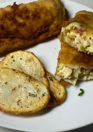 Una foto de Coxinhas de pollo 🍗 (las hice con forma de empanadas)