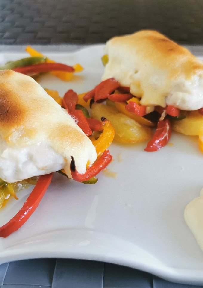 Una foto de Lomos de merluza gratinados con alioli