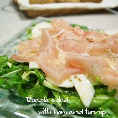 A picture of Turnip, Cured Ham and Arugula Salad.