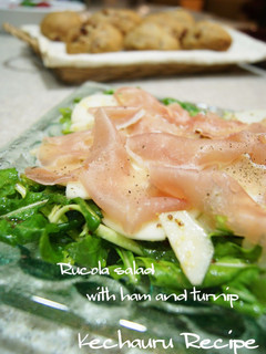 A picture of Turnip, Cured Ham and Arugula Salad.