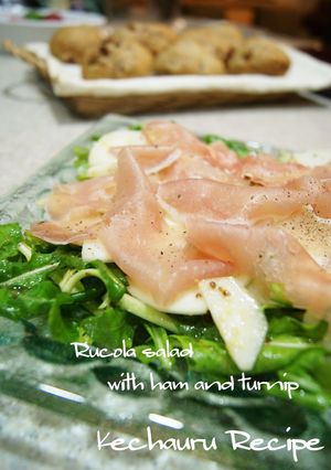 A picture of Turnip, Cured Ham and Arugula Salad.