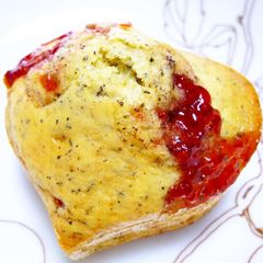 A picture of Black Tea and Strawberry Jam Cupcake.