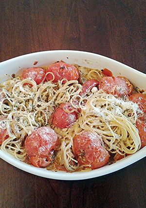 A picture of Angel Hair Pasta with Garlic,Olive oil, Cherry Tomatos, Peppers and Onions.