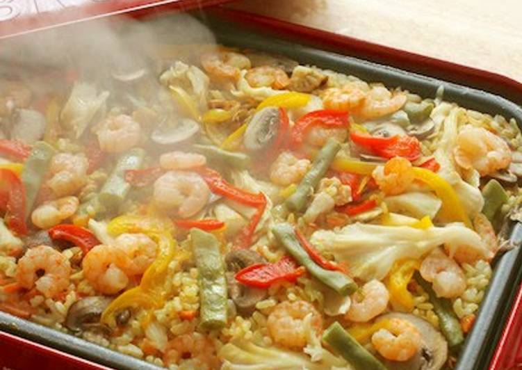 Why Most People Fail At Trying To Curry Flavored Paella Cooked on an Electric Griddle