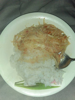 A picture of White rice and cabbage.