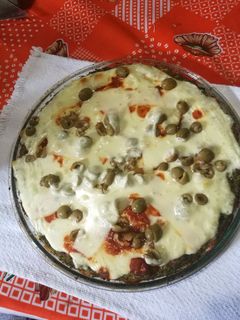 Una foto de Brócoli en pizza
