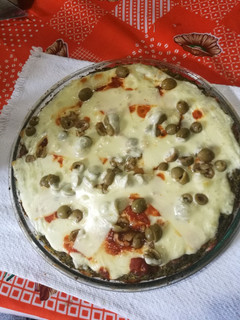 Una foto de Brócoli en pizza
